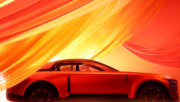 Elegant side view of the red Toyota century 2025 with flowing orange drapery in the background, emphasizing the car smooth lines sporty wheels, and contemporary luxury design.